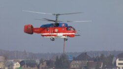 Rusiya FHX-yə aid Ka-32 RA-31112 helikopteri Ostafyevo üzərində təlim zamanı (Arxiv fotosu)
