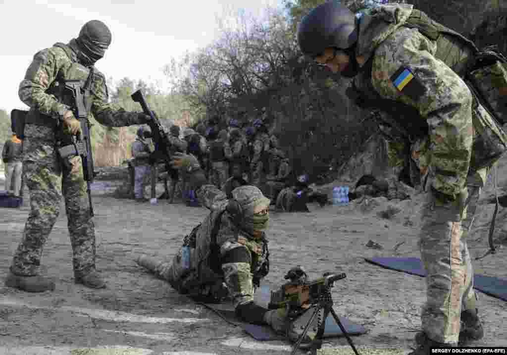 &quot;Siberian Battalion&quot; members practicing at a shooting range. Their commander, a Ukrainian who introduced himself by the call sign Batya, said some of the recruits were now ready for battle.&nbsp;