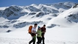 Volunteers help Milena Velkovska, 43, who has cerebral palsy, climb the Rila Mountains in western Bulgaria on March 23.<br />
<br />
The trio were a part of an expedition organized by the <a href="https://www.facebook.com/elaitifoundation">Ela I Ti (You Come Too) foundation</a>&nbsp;to&nbsp;enable five people with severe disabilities reach one of the lakes of the famous mountain range with the help of 50 volunteers.&nbsp;&nbsp;