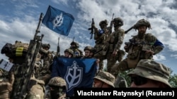 Члени російського добровольчого корпусу біля російського кордону в Україні 24 травня 2023 року, фото ілюстративне