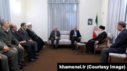 Sinwar (left) traveled to Iran with Haniyeh in 2012 to meet Supreme Leader Ayatollah Khamenei.