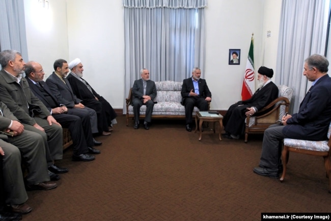 Sinwar (left) traveled to Iran with Haniyeh to meet Supreme Leader Ayatollah Khamenei in 2012.
