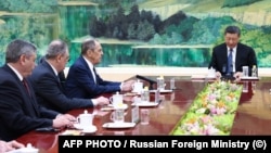 Ruski ministar vanjskih poslova Sergej Lavrov i kineski predsjednk Xi Jinping tokom sastanka u Pekingu, 9. aprila 2024.