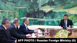 Глава МИД России Сергей Лавров на встрече с Си Цзиньпином в Пекине 9 апреля 2024 года