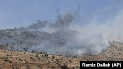 Чад над ридовите на Либан по израелските артилериски напади, 14 јуни 2024