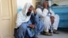 Relatives attend the funeral of an Afghan man who was killed in the suicide attack in Kandahar on March 21.