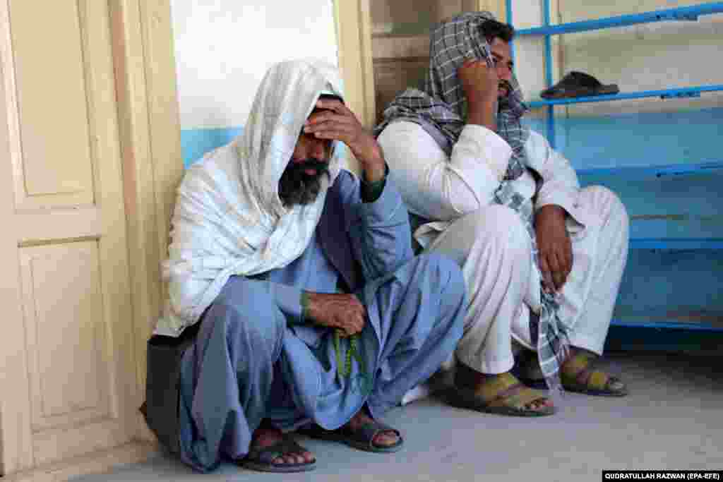 Relatives attend the funeral of an Afghan man who was killed in a suicide attack in Kandahar on March 21.