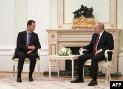 Президент России Владимир Путин и Башар Асад в Кремле. 15 марта 2023 года