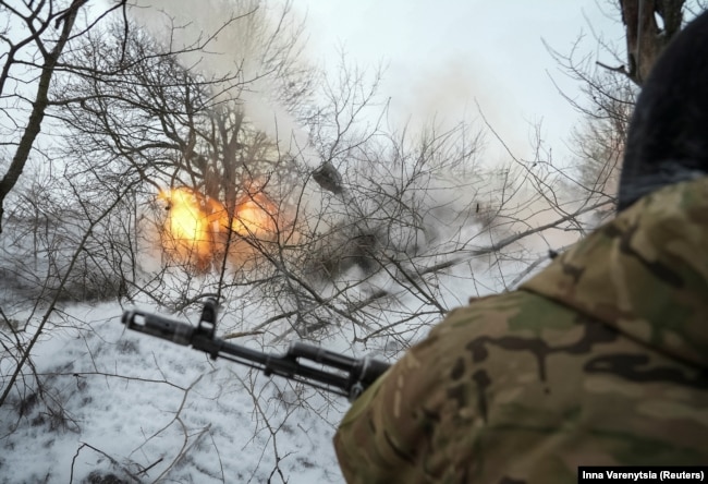 Ukrainian forces return fire near the Donetsk region town of Chasiv Yar in February.