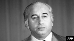 Pakistani President Zulfikar Ali Bhutto listens during a press conference in Paris in July 1973.