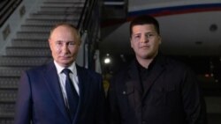 Президент России Владимир Путин и сын главы Чечни Адам Кадыров. Иллюстративная фотография