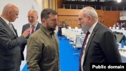 Spain - Armenian Prime Minister Nikol Pashinian talks to Ukraine's President Volodymyr Zelenskiy during a European summit in Granada, October 5, 2023.