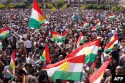 Демонстрация протеста курдов против невыплаты зарплаты госслужащим федеральным правительством Ирака в Багдаде, а также в поддержку курдов в Иране. Город Киркук в Иракском Курдистане, 5 сентября 2023 года