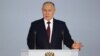 Russian President Vladimir Putin delivers his annual address to the Federal Assembly in Moscow on February 21.