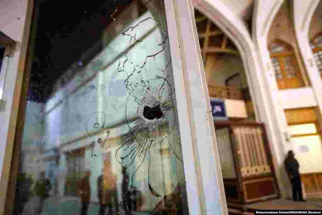 A bullet hole is seen after an attack at the Shah Cheragh Shrine in Shiraz, Iran.