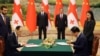 Georgian and Chinese officials sign a strategic partnership agreement in China in July 2023. 