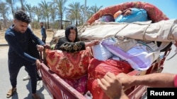 Banorët duke u larguar nga qyteti Rafah. Maj 2024.