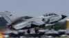 Njemački avion ECR Tornado polijeće uoči vježbi "Air Defender 2023" sa vojnog aerodroma Jagel, u sjevernoj Njemačkoj, juni 2023. 