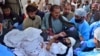 Paramedics and volunteers transport a wounded man to hospital in the city of Quetta after a blast ripped through a religious procession on September 29 in the Mastung district of Pakistan&#39;s southwestern Balochistan Province.<br />
<br />
The deadly attack, a suspected suicide bombing, is said to have killed dozens during a birthday celebration for Islam&#39;s Prophet Muhammad.