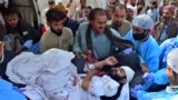 Paramedics and volunteers transport a wounded man to hospital in the city of Quetta after a blast ripped through a religious procession on September 29 in the Mastung district of Pakistan&#39;s southwestern Balochistan Province.<br />
<br />
The deadly attack, a suspected suicide bombing, is said to have killed dozens during a birthday celebration for Islam&#39;s Prophet Muhammad.