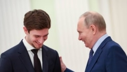 Президент России Владимир Путин и Эли Кадыров