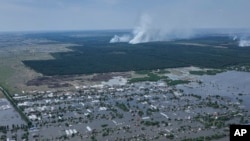 Затоплений мікрорайон Херсона, внаслідок руйнування контрольованої і замінованої Росією греблі Каховського водосховища. 7 червня 2023 року