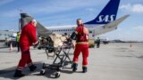 A wounded Ukrainian soldier is transported to a medical evacuation plane (medevac) in Rzeszow, Poland, on March 22.<br />
<br />
With over 800 health facilities in Ukraine targeted since Russia&#39;s full-scale invasion, medevac flights have been instrumental in saving the lives of seriously wounded soldiers and civilians.<br />
<br />
<br />
<br />
<br />
<br />
&nbsp;