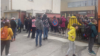 Children and teachers gather outside a Sofia school on March 27 that received an e-mailed bomb threat. 