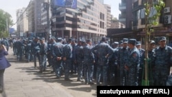 Armenian police stand outside the Opera House on Yerevan's central Freedom Square on May 15. 