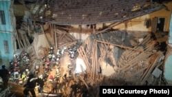 Clădirea s-a dărâmat în timp ce în interiorul acesteia se aflau mai mulți copii. Cel puțin patru dintre ei au fost răniți. (DSU courtesy photo) 