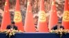 Кыргызстандын президенти Садыр Жапаров менен Кытайдын лидери Си Цзинпин документтерге кол коюу учурунда. 