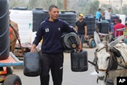 Palestinci dolaze po vodu za piće, Rafa, 28. oktobra