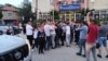 Residents and police scuffle outside a Serbian-run bank in North Mitrovica on May 21, when Kosovar police closed six such institutions.
