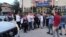 Residents and police scuffle outside a Serbian-run bank in North Mitrovica on May 21, when Kosovar police closed six such institutions.