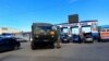 Российский военный грузовик на площади возле центрального рынка в Керчи, Крым, 2023 год