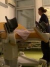 Medical stuff showing instruments adjusted for gynecological exam for women with disabilities, Banja Luka, June 2023.