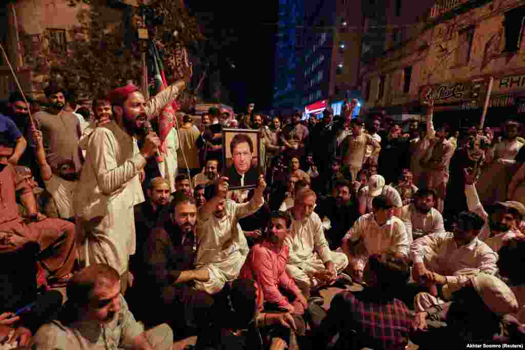 PTI supporters chant anti-government slogans in Lahore on March 14. &nbsp;