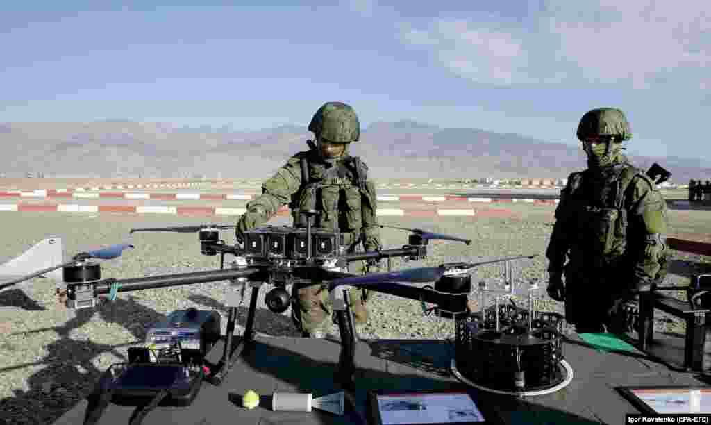 Russian troops with a large quadcopter are seen with a bomblet during the CSTO exercises.&nbsp; In contrast to the lukewarm response to Armenia&rsquo;s 2022 request for help, the CSTO deployed around 2,300 troops to Kazakhstan amid widespread anti-government protests in January 2022. Astana claimed the unrest, that was sparked by protests over fuel prices, was led by &ldquo;foreign terrorists.&quot;&nbsp;