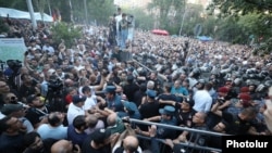 Armenia - Protesters clash with riot police in Yerevan, June 12, 2024.