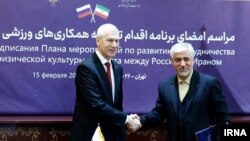 اولگ ماتیستین (چپ) و حمید سجادی، وزرای ورزش روسیه و ایران