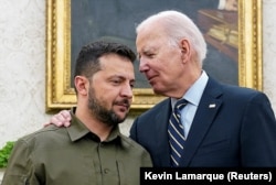 Ukrainian President Volodymyr Zelenskiy (left) is embraced by U.S. President Joe Biden in the Oval Office at the White House on September 21.