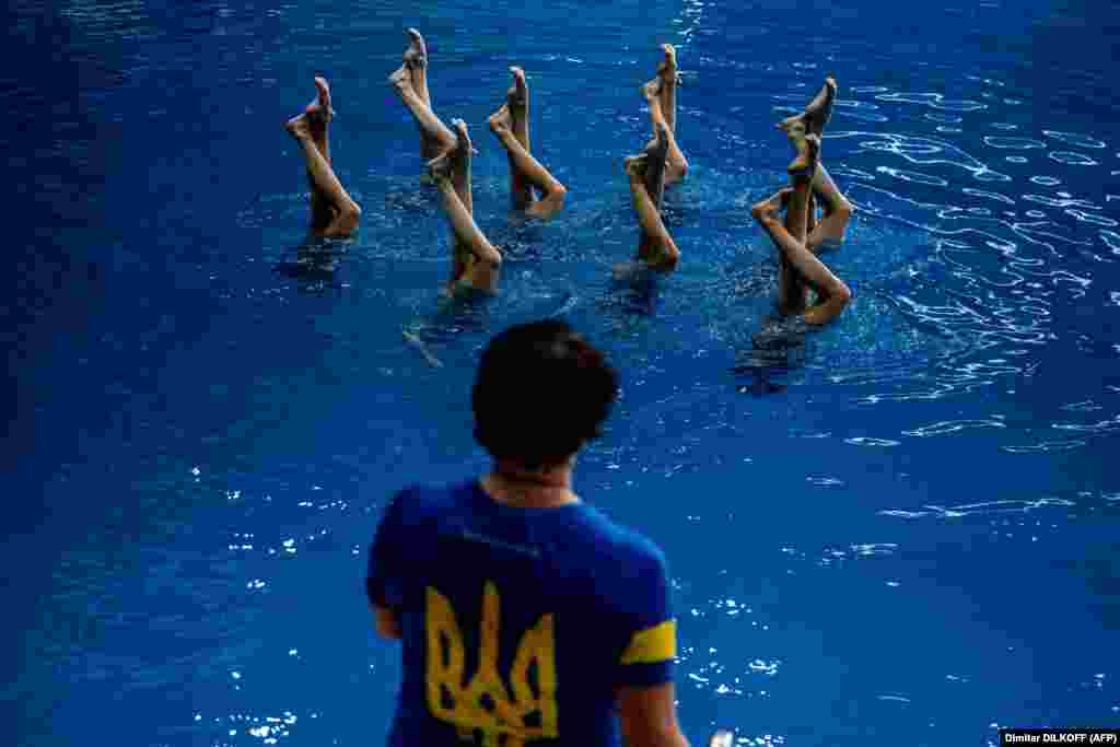 Ukrainian Olympic synchronized swimmers take part in a training session in Kyiv on April 6.&nbsp;