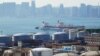 Нефтяной терминал компании China Ocean Shipping Company (COSCO) в порту города Далянь, Китай