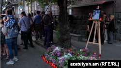 Armenia- Flowers are put on a street in Yerevan on the second anniversary of the death of Sona Mnatsakanian, April 26, 2024
