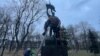 The authorities in Kyiv continued their policy of removing Soviet-era monuments in the capital, dismantling a memorial to the January 1918 communist uprising,