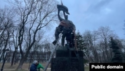 The authorities in Kyiv continued their policy of removing Soviet-era monuments in the capital, dismantling a memorial to the January 1918 communist uprising,