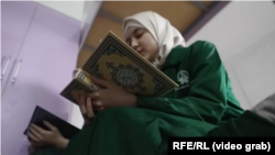 A girl studies at the Sayida Khadijah madrasah.