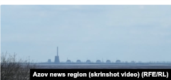Окупований Енергодар, який видно з Нікополя