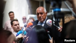 Boyko Borisov, leader of the center-right GERB party, speaks to the media in Sofia on June 9.