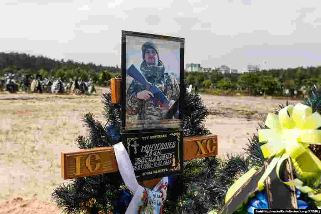 RFE/RL photographer Serhii Nuzhnenko was in a position near Minuhaliyev when he was hit. He photographed the soldier&#39;s removal from the battlefield and later visited Minuhaliyev&#39;s grave in his hometown of Irpin, just outside Kyiv. &nbsp;